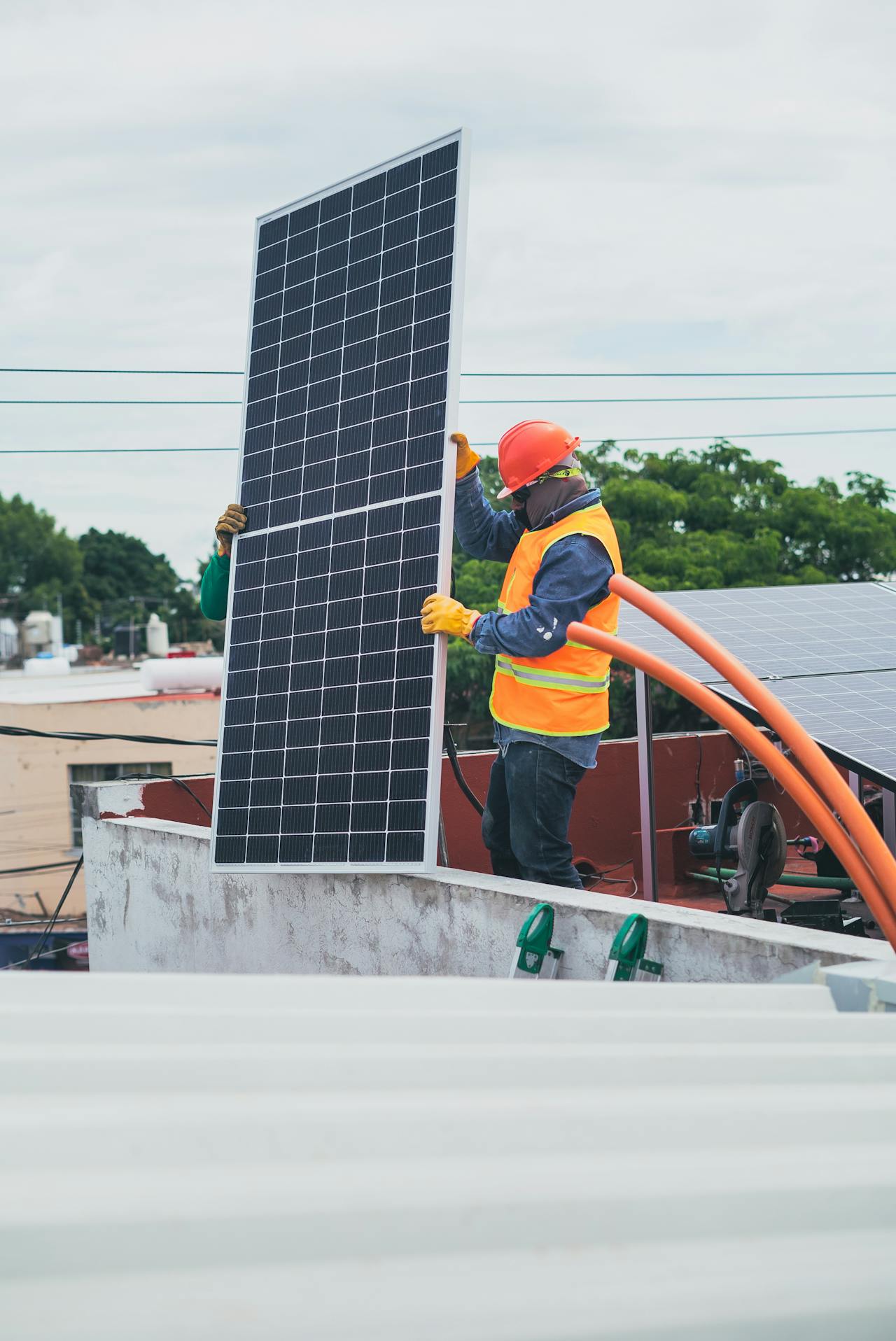 solar field work for installation. abuja solar and energy company. abuja residential home with rooftop solar installation and battery system